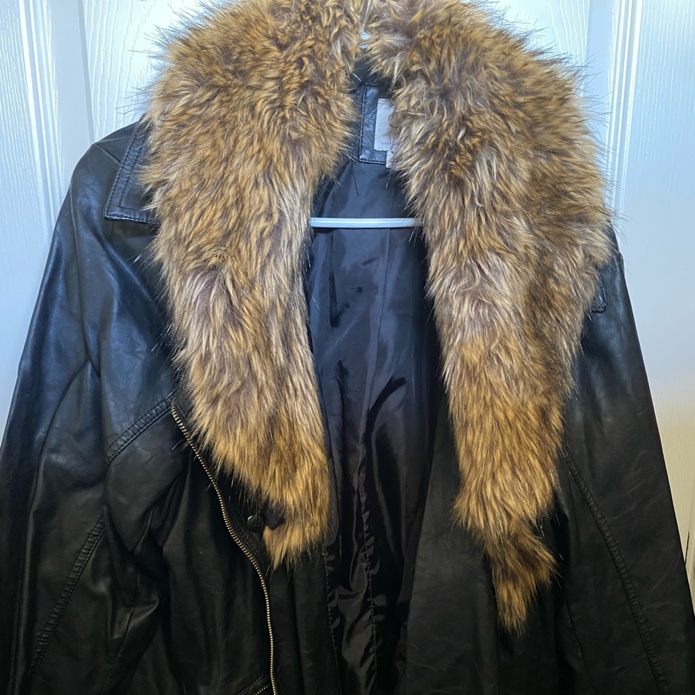 Fur trimmed leather jacket. Perfect for any season!